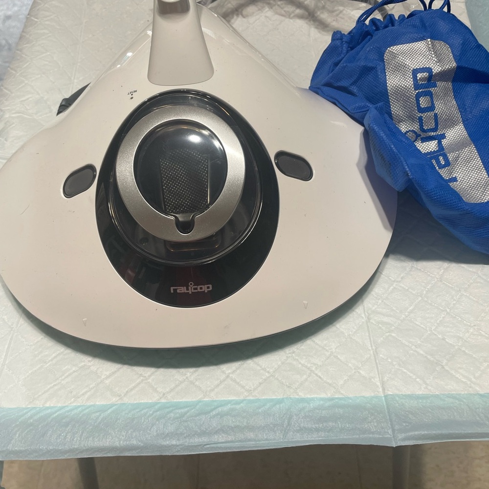 White Handheld Sanitizer Vacuum Cleaner - Compact Fabric Care